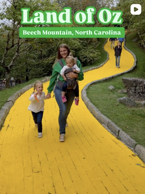 Family walking the yellow brick road at Land of Oz